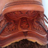 Half tooled Vaquero Lace with Daffodil flower Wade Saddle
built on a 94 degree bar that fits a well built muscular shoulders -
The seat is finished at 15 & 1/2 inch with a close contact deep pocket fit -
Gullet is 7 & 1/2 inch height by 6 & 1/2 width with the back hand hole width at 4 inch -
Horn is 6 inch height by 5 and 1/2 inch width Guadalajara at 31 degree pitch - Cantle is 4 and 1/2 inch in height by 12 & 1/2 in width with a Cheyenne roll - Flat plate riggin at 7/8ths
- leather lined 5 inch Stainless Steel Moran Stirrups .